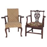 A George III mahogany and upholstered library elbow chair in Chippendale style,