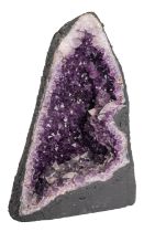 A semi-cut amethyst geode, of lancet form, 33cm high,