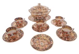 A group of Derby porcelain decorated with Imari designs, comprising three cups, five saucers,