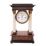 An Austrian alabaster and simulated portico mantel clock,