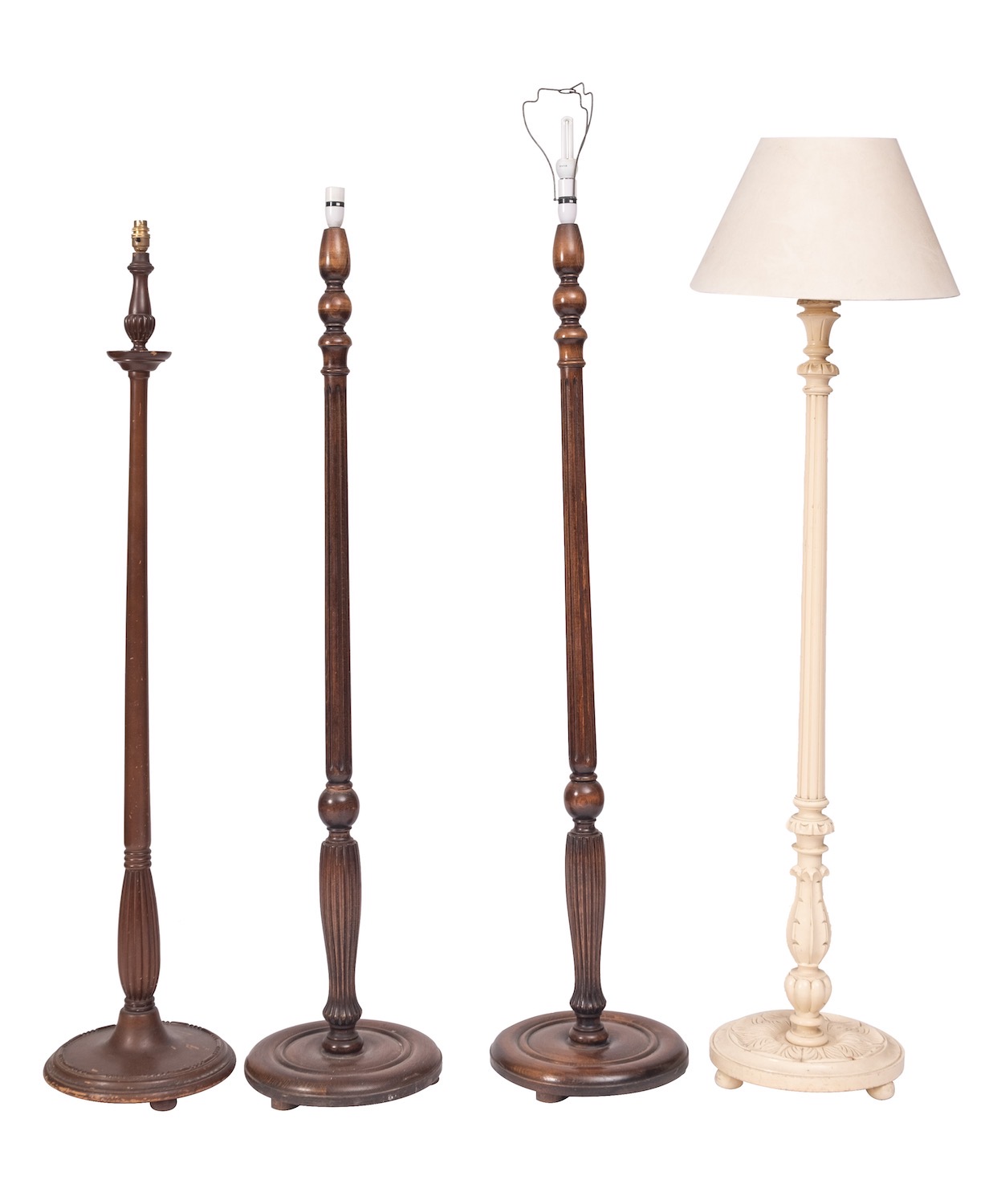 A pair of stained hardwood standard lamps in early 19th century taste, 20th century; with fluted,