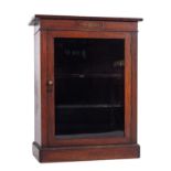 A Regency or George IV rosewood and brass inlaid pier cabinet,