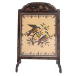 A black lacquered wood and beadwork embroidered firescreen,