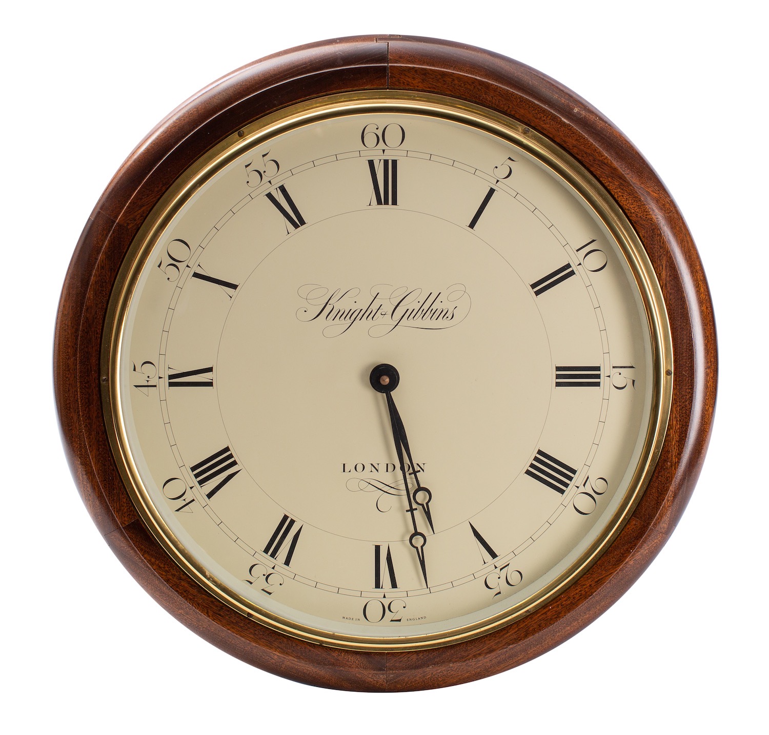 A modern mahogany wall clock with quartz movement, the dial signed Knight & Gibbins,