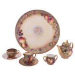 A Royal Worcester porcelain miniature tea set, comprising a circular tray, tea pot and cover,