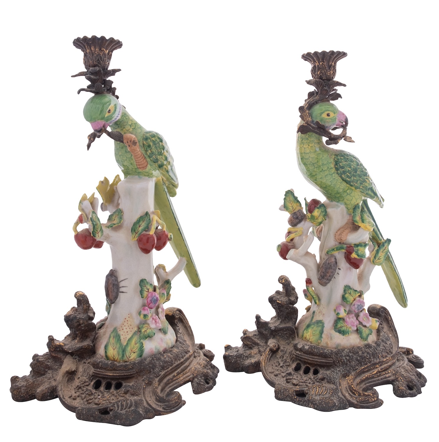 A pair of reproduction ceramic and gilt-metal mounted parrot candlesticks, 37cm.