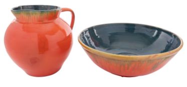 A large Wesuma pottery jug & bowl decorated in green and orange glazes,