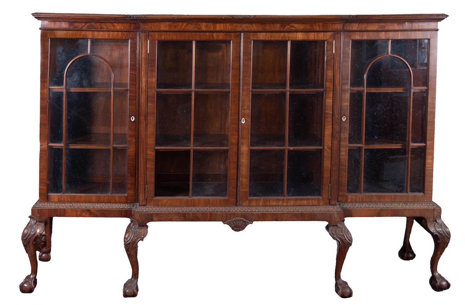 A mahogany and glazed breakfront bookcase in George III taste,