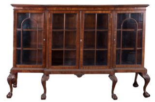 A mahogany and glazed breakfront bookcase in George III taste,