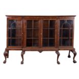 A mahogany and glazed breakfront bookcase in George III taste,