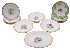 A 19th century English porcelain part dessert service each piece painted with a botanical vignette