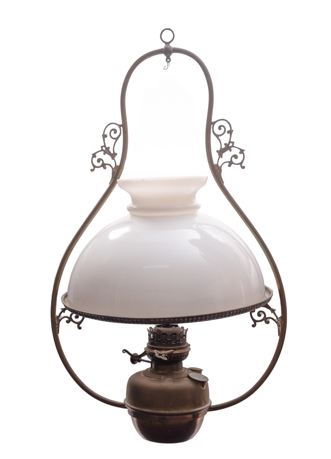 A late Victorian brass and milk glass hanging oil lamp, circa 1900; the domed shade with open vent,