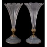 A pair of gilt-metal and marble mounted glass trumpet vases of slice-cut petal form,