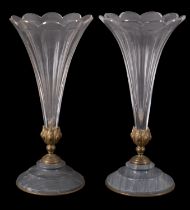 A pair of gilt-metal and marble mounted glass trumpet vases of slice-cut petal form,