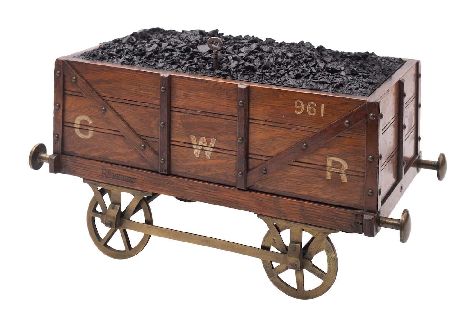 A late Victorian or Edwardian oak and brass mounted novelty cigar box, modelled as a coal tender,