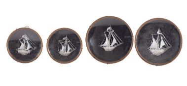 A set of four 19th century cased glass friggers depicting sailing ships in clear and milk glass,