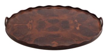 A George III oval oyster laburnum tray, late 18th century; formed of radiating veneers,