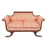 A Regency mahogany and later upholstered sofa,