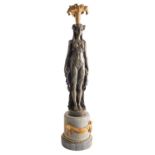 A Continental bronze and marble mounted figural candelabrum stand,