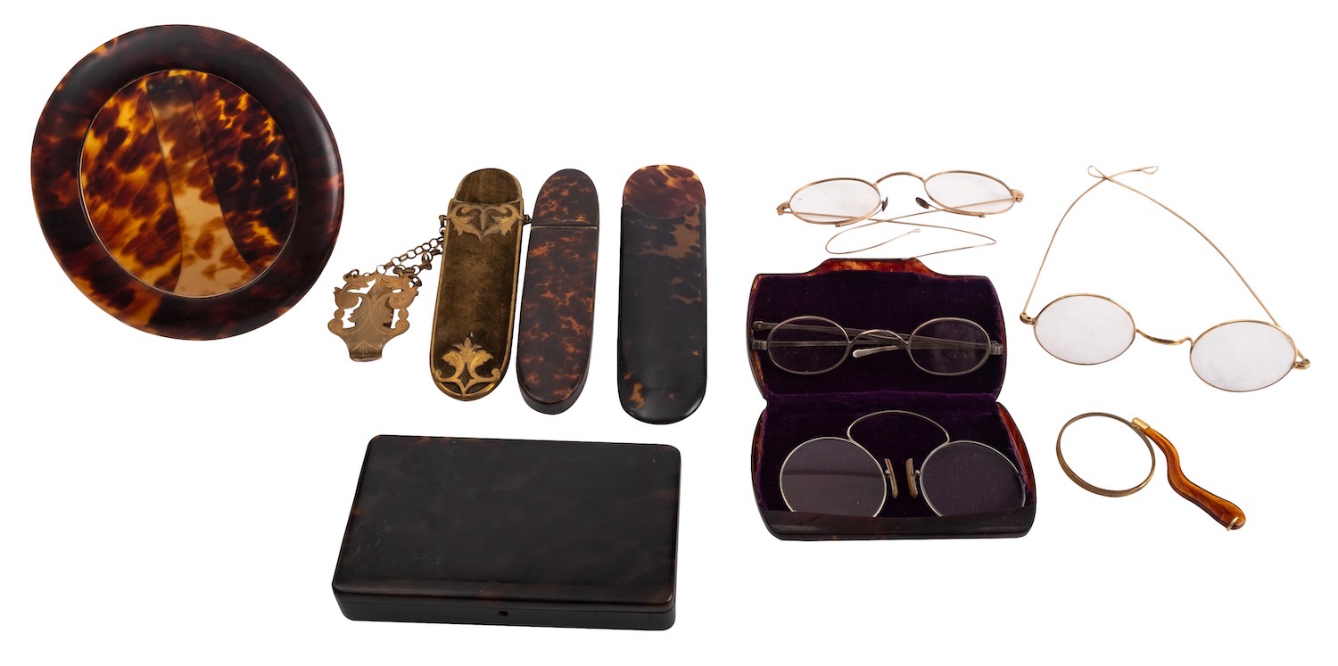 A George III tortoiseshell and mother-of-pearl inset spectacles case,