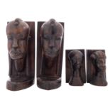 Two pairs of African carved ebony book ends,