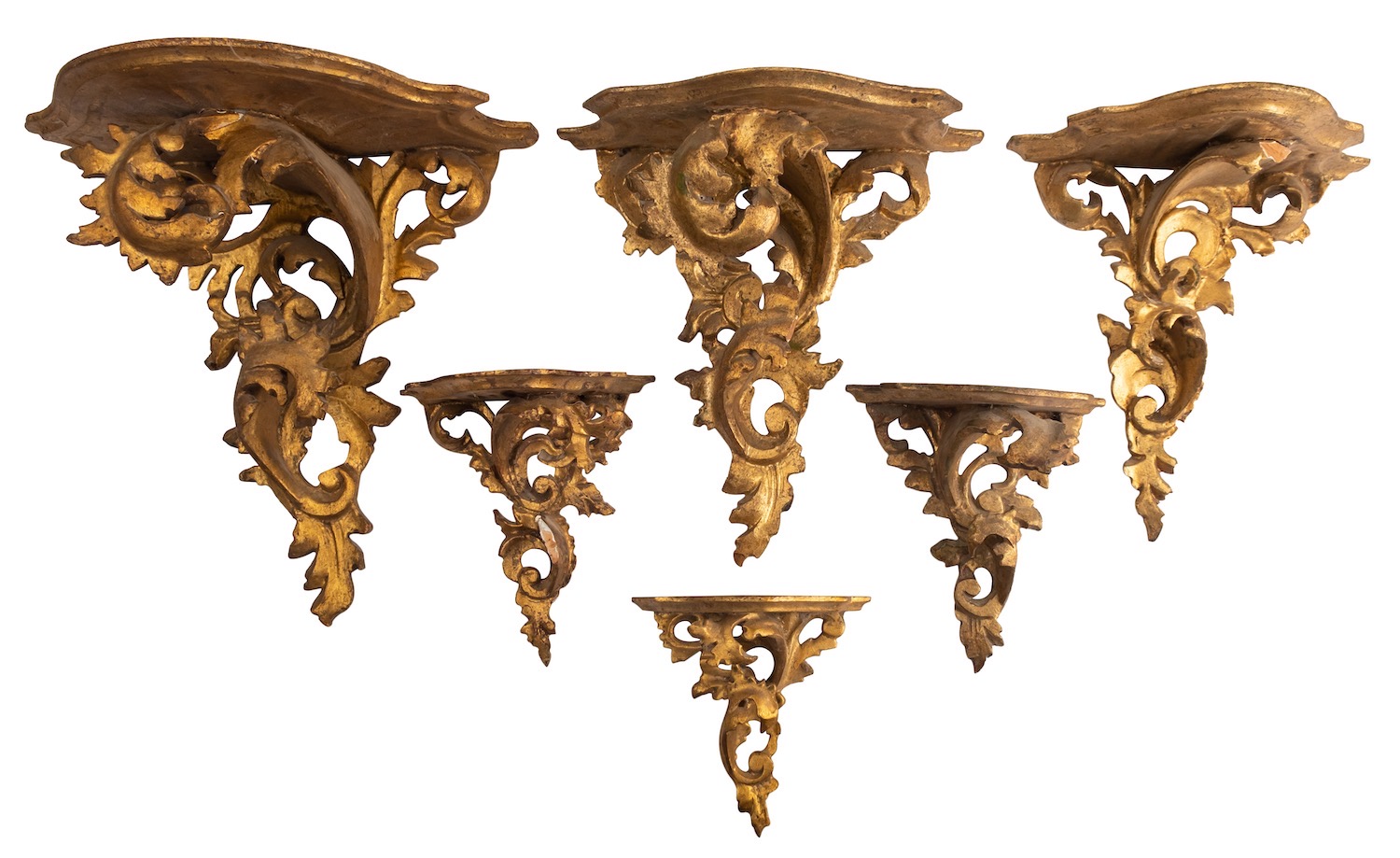 Six Italian carved and giltwood wall brackets,