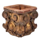 A carved and giltwood stand modelled as a column capital,