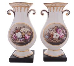 A pair of Staffordshire pearlware vases of baluster quatrefoil form with scroll handles,