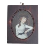 A Chinese reverse painted miniature half portrait on glass,