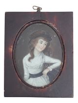 A Chinese reverse painted miniature half portrait on glass,