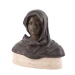 A patinated metal bust of a maiden,