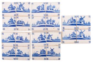 A set of twenty Dutch Delft blue and white tiles in panels of four,