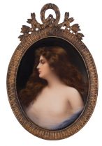 A Dresden porcelain oval plaque painted with a female half portrait in a diaphanous top, 14cm high,