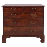 A George III mahogany chest of drawers, circa 1770; the top with moulded edges,