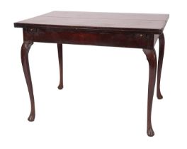 A late George II or early George III mahogany extending supper table, circa 1760,