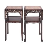 A pair of Chinese carved and stained hardwood and marble inset stands,