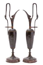 A pair of French bronze and marble mounted ewers, in Neoclassical taste,