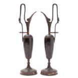A pair of French bronze and marble mounted ewers, in Neoclassical taste,