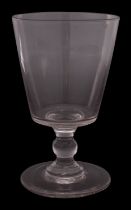 A large Georgian mixing glass the bucket shaped bowl on single knopped stem, 20cm high.