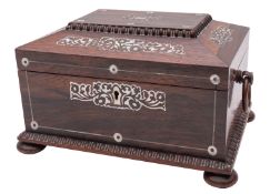 An early Victorian mother of pearl inlaid rosewood sewing box of sarcophagus form with loose ring