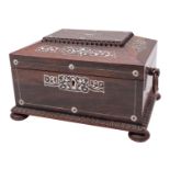 An early Victorian mother of pearl inlaid rosewood sewing box of sarcophagus form with loose ring