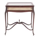An Edwardian mahogany and glazed bijouterie table,