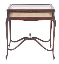 An Edwardian mahogany and glazed bijouterie table,