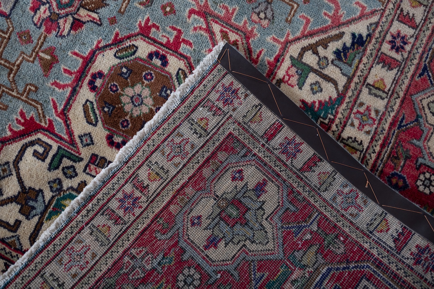 A Heriz carpet, the pastel blue field with a central rose geometric pole medallion, - Image 3 of 3