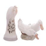 Two Royal Copenhagen porcelain bird groups, comprising a heron,