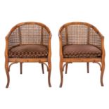 A pair of carved beech and canework bergere chairs,