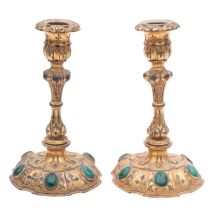 A pair of gilt metal and malachite mounted candlesticks, possibly Russian,
