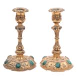 A pair of gilt metal and malachite mounted candlesticks, possibly Russian,