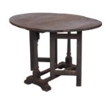 An oak gateleg table,