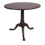 A George II mahogany circular occasional table, mid 18th century; with single piece flip top,